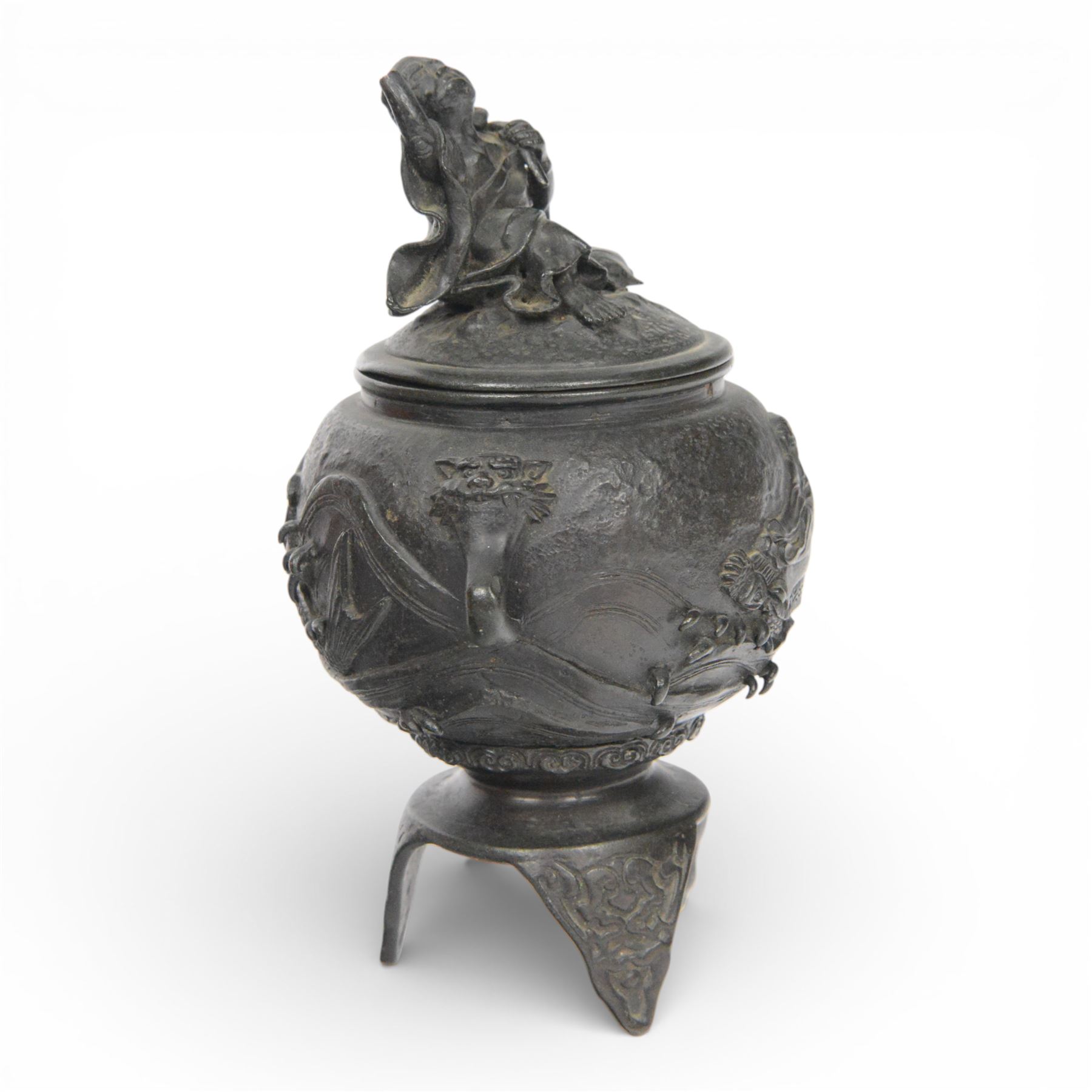 Pair of Japanese bronze koro, raised upon three feet, he body of the koro decorated with figures and animals, the cover mounted with figures, H24cm