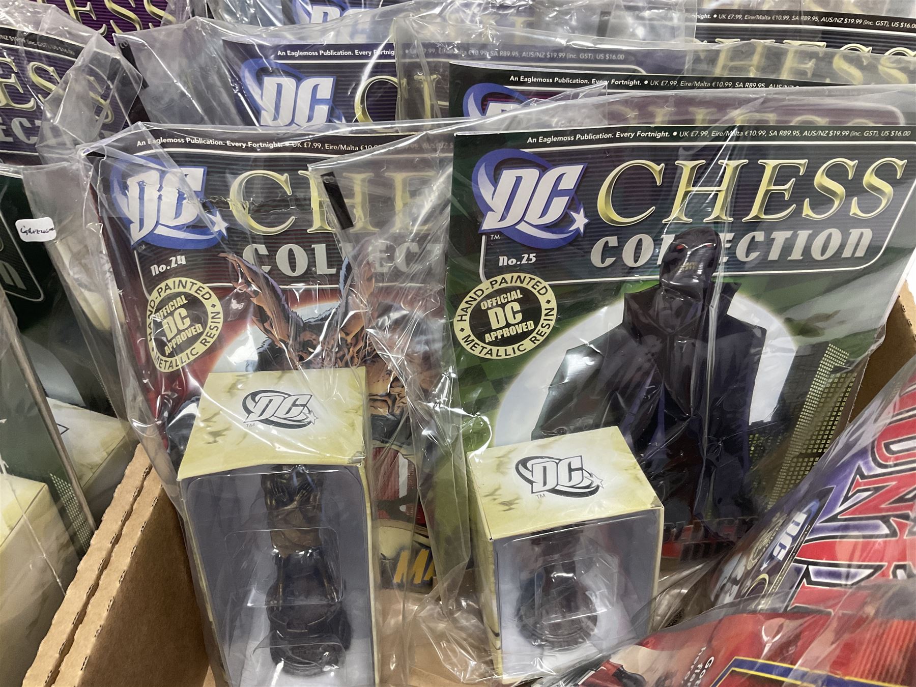 Eaglemoss DC Chess Collection - thirty=-two magazines with models each as issued in unopened plastic bags (32)