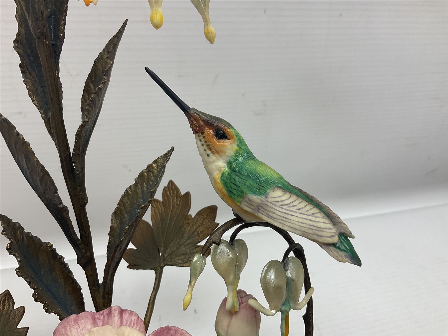 Franklin Mint House of Faberge, four humming bird figure groups, comprising Flight of Fancy, Beauty in Bloom, Splendor in the garden and The Enriched Garden, largest H35cm
