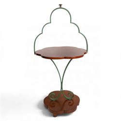 Art Deco stand, with scalloped wooden shelf, within green painted metal frame with scroll ...