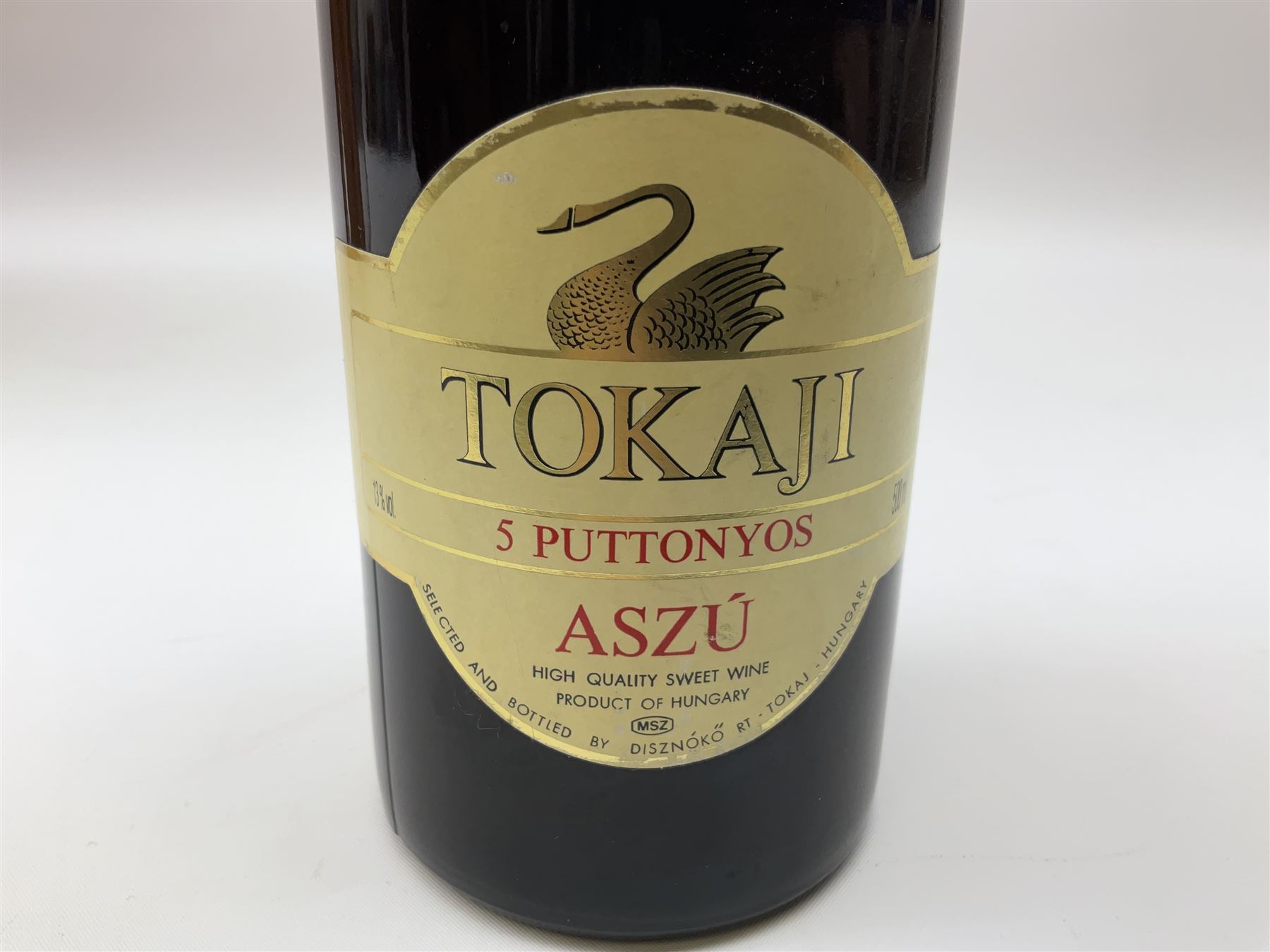 Presentation set comprising Hine Antique cognac 70cl, 40% volume and four miniature bottles of Hine cognac, 1957, 1960, two 1982, all 5cl, 40%   together with bottle of Tokaji sweet wine, 500ml, 13%