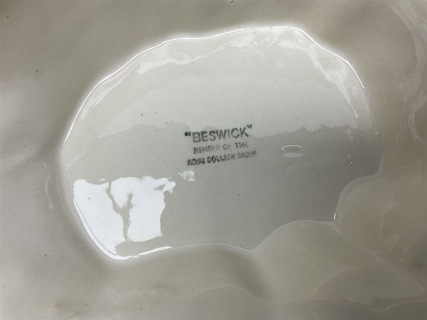 Seven Beswick Beatrix Potter figures, comprising Sally Henny Penny, Johnny Town-Mouse, Mrs Tiggy-Winkle, Mrs Tittlemouse, Tom Kitten, Pig-Wig and Squirrel Nutkin, together with a Beswick tree trunk display stand, stand L30cm