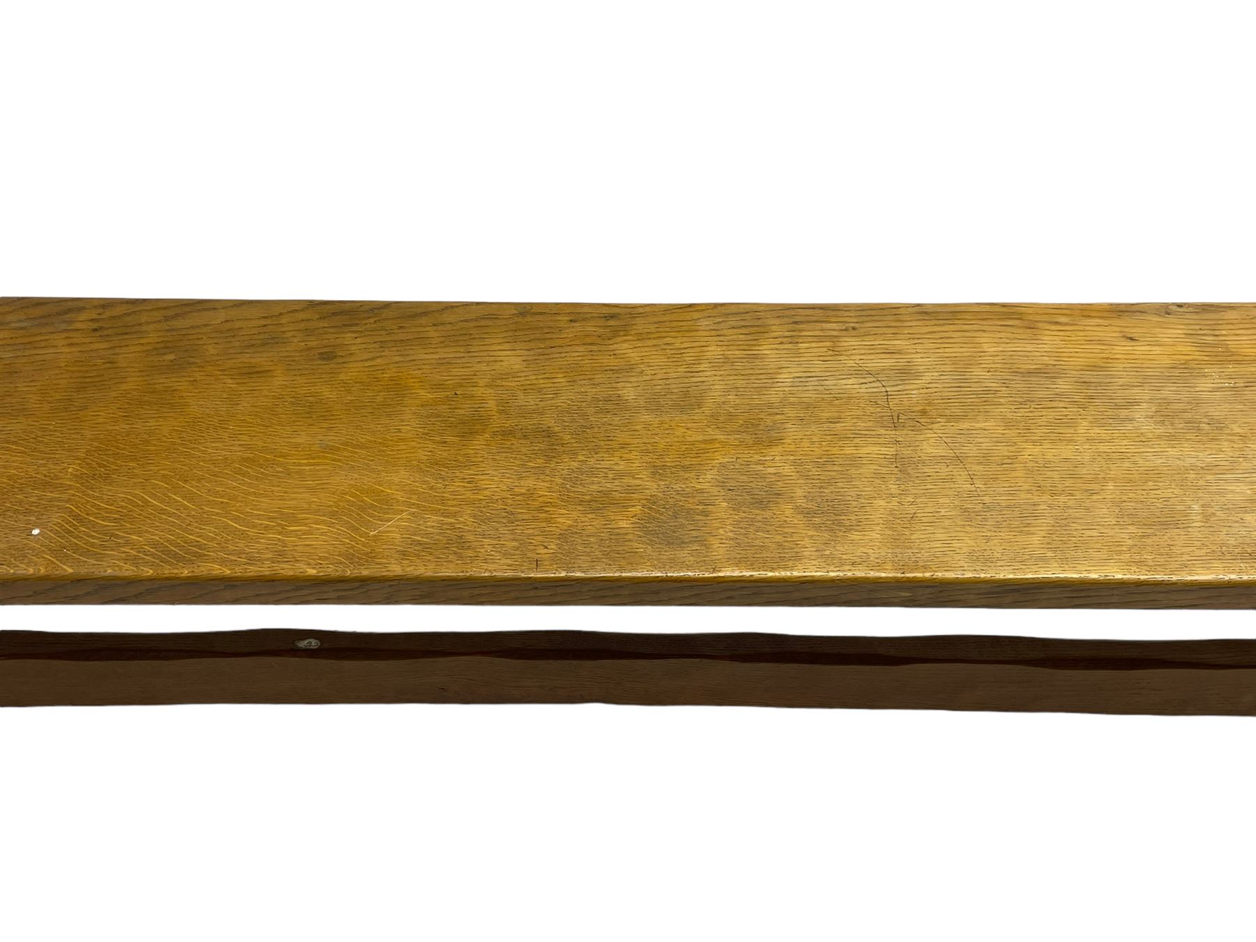 Gnomeman - adzed oak narrow bench, rectangular seat on shaped end supports united by pegged stretcher, carved with gnome signature, by Thomas Whittaker, Little Beck 