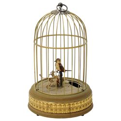 Reproduction automaton of a bird in a cage