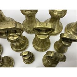 Set of seventeen Victorian brass bell weights