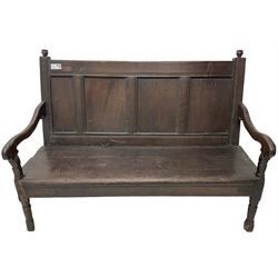 18th century oak hall bench or settle, quadruple panelled back with moulded rails, over a solid seat, raised on front turned supports