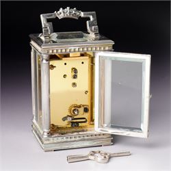 Chas Frodsham -  Miniature carriage clock with platform lever escapement commemorating the marriage of Prince Charles and Lady Diana Spencer, the white dial with an engine turned gilt surround and fleur de lis in silver case with fluted columns and bevelled glass panels H10cm  No.43/1000 London 1981 with key