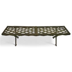 Two cast iron garden benches, rectangular seat with lozenge grate panels, on X-framed supports 