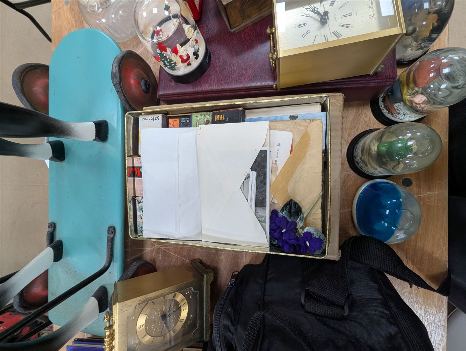 Dog cigarette box, glass decanter, two brass mantel clocks, snow globes, collection of Smash, Viz, Scorcher magazines, 1997 Glastonbury programme, JVC video camera, Sony Handy Cam and other collectables