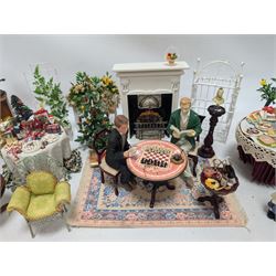 Dolls house furniture, including pianos, fireplace, plants, flower arrangements, tables, chairs, six figures and a collection of instruments and other accessories