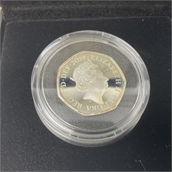 Three The Royal Mint United Kingdom silver proof piedfort fifty pence coins, comprising 2017 'Sir Isaac Newton', 2019 'A Celebration of Sherlock Holmes' and 'Celebrating the Life of Stephen Hawking', all cased with certificates 