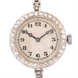 Audemars Piguet & Co Art Deco ladies platinum, diamond set manual wind wristwatch, movement No. 19931, cream / silvered dial with Arabic hour markers, the bezel milgrain set with round cut diamonds, to a platinum expanding bracelet
