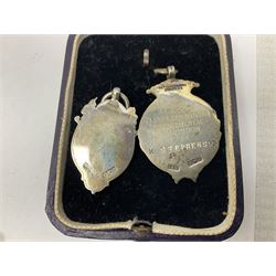 Four St John's silver fobs, together with two silver Directors Ambulance shield fobs and two other St Johns items 