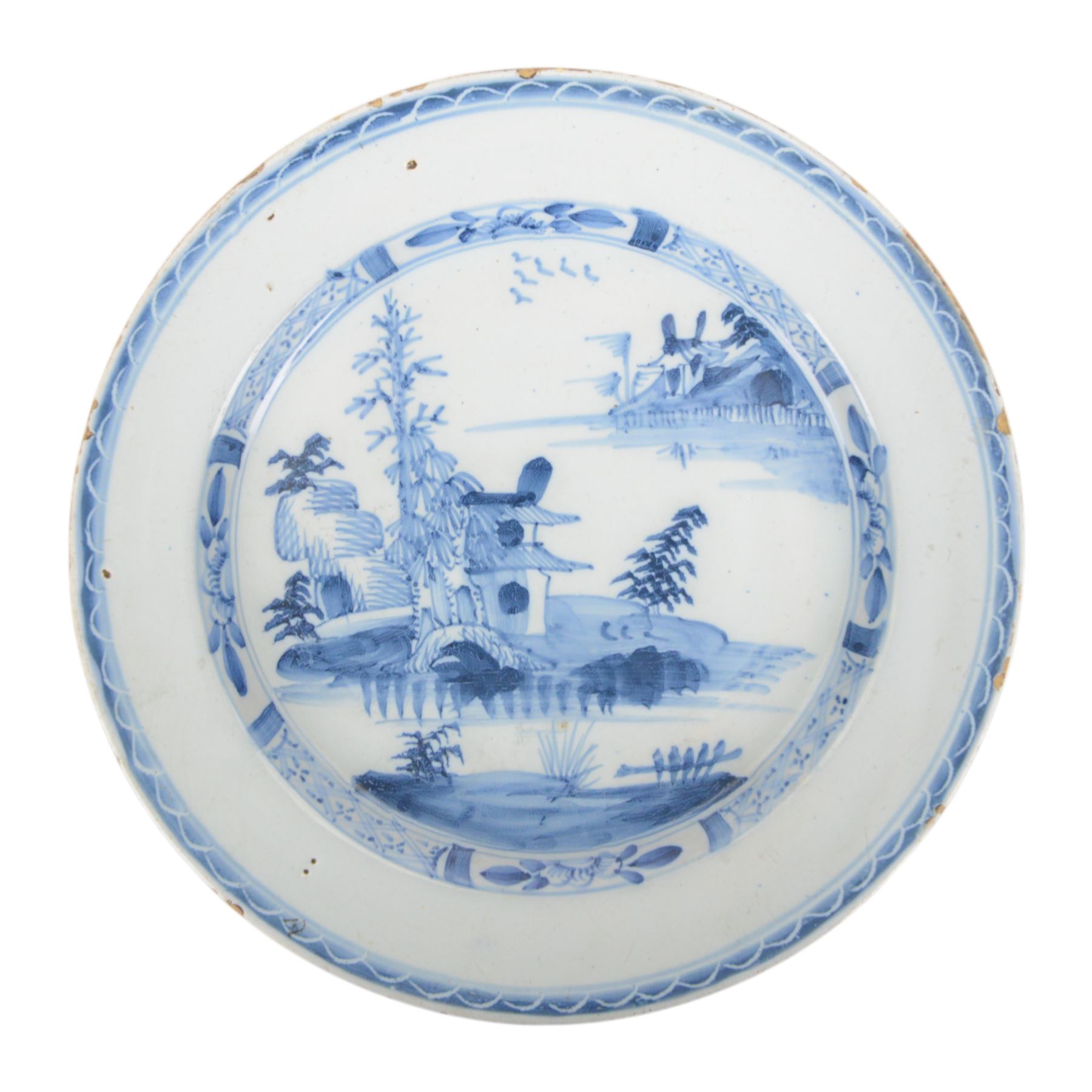 19th century Cantonese plate of octagonal form decorated to the centre with a garden of flowering peonies, together with two other 19th century plates and two serving platters each depicting temples in landscapes, octagonal plate W31cm  