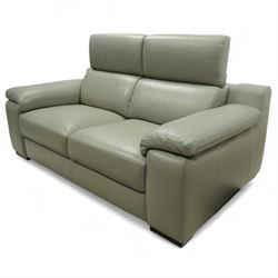 Modern Italian style leather two-seat sofa, upholstered in pale grey leather with panel stitched cushioning, with retractable head rests and broad arms, raised on square feet
