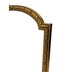 Large gilt framed overmantle mirror, arch top with carved pediment