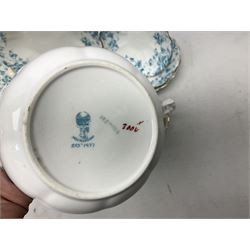 Edwardian David Chapman & Sons tea service for six, of lobed form decorated with blue transfer printed foliate decoration and gilt rims