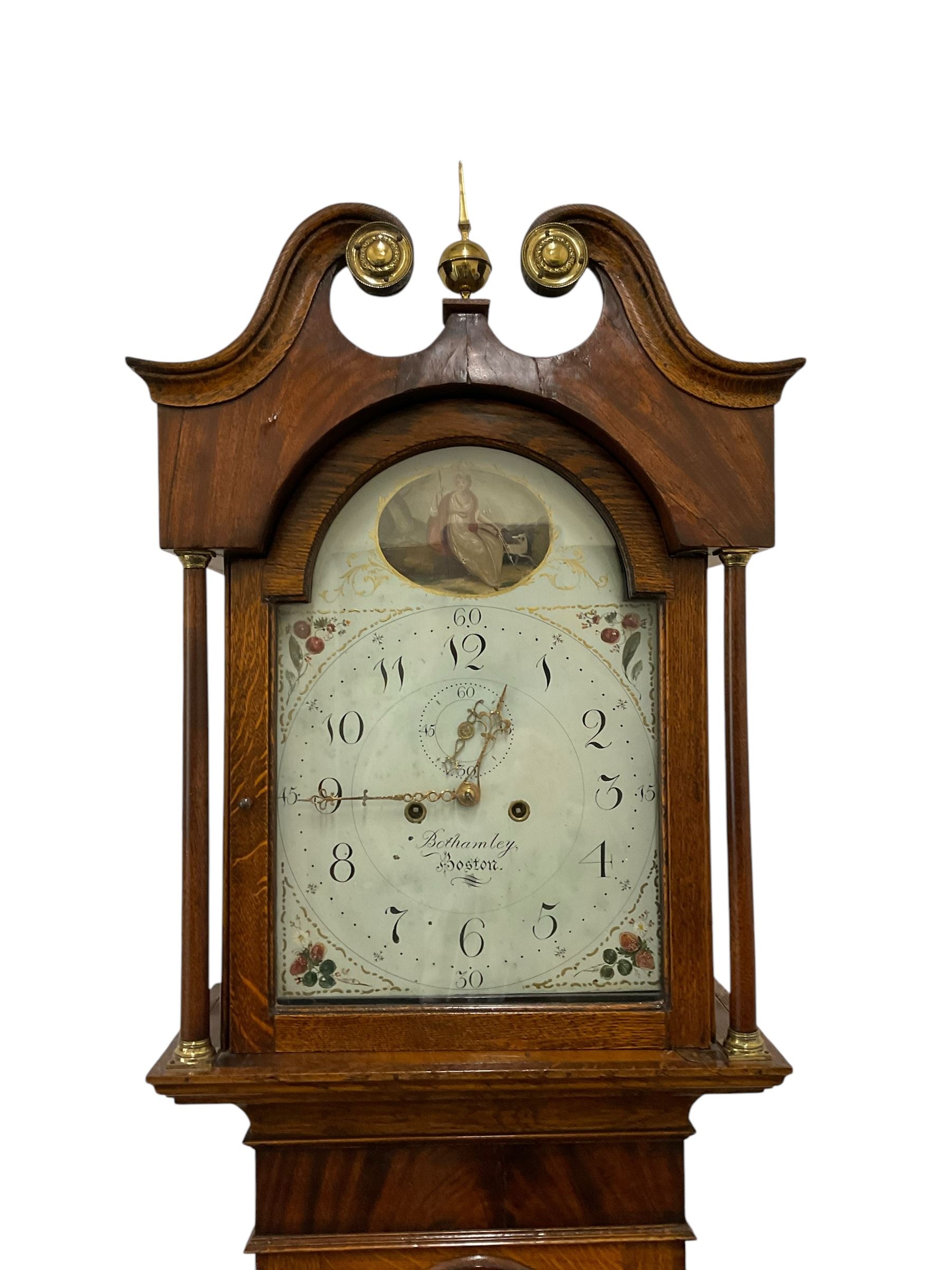 Benjamin Bothamley of Boston (Lincs)-Early 19th century oak and mahogany 8-day longcase clock c 1820,  with a swan neck pediment, brass ball and spire finial and paterie, with detached pilasters to the hood door and curved back spats, trunk door with inlay, crossbanding and shaped curved top, rectangular plinth raised on bracket feet, painted dial with images of fruit to the spandrels and  a cameo depiction of a maiden and dog to the arch, with upright Arabic numerals for the hours and quarter minutes, minute markers, seconds dial and stamped brass hands, dial pinned directly to a rack striking movement striking the hours on a bell.
With weights and pendulum.
This item has been registered for sale under Section 10 of the APHA Ivory Act