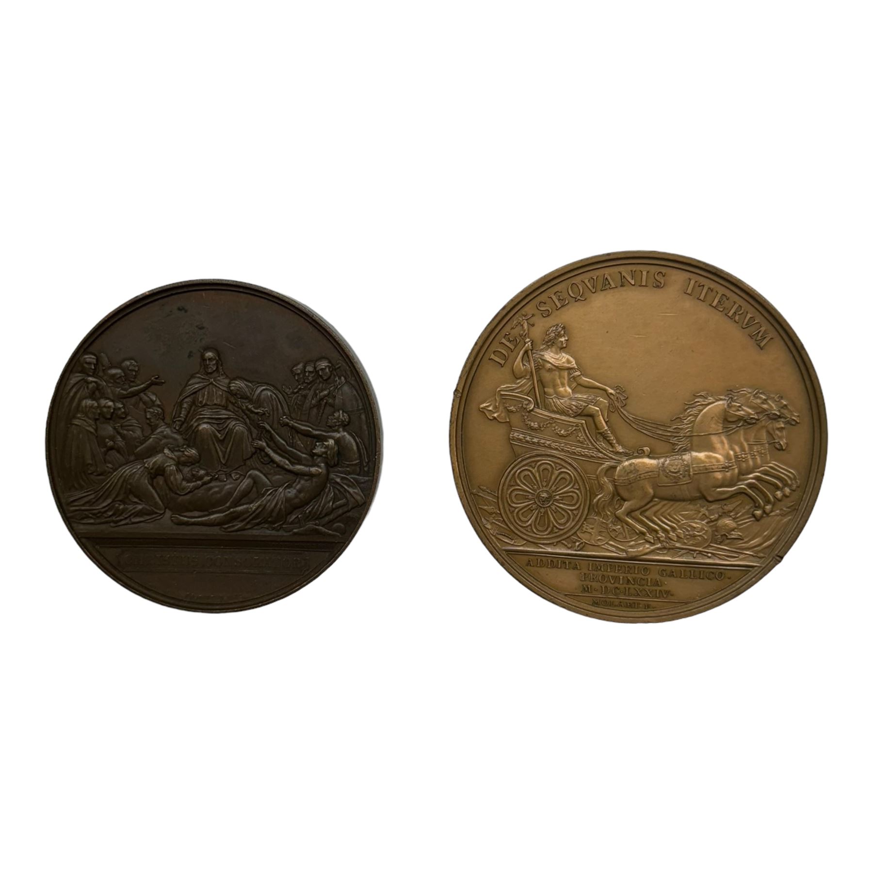 Copper medallion by Allen & Moore, decorated in relief with Christ holding up his hand in blessing inscribed 'Salvator Mundi', decorated verso with religious scene, inscribed 'Christus Consolator', together with a similar medallion, decorated in relief with Louis XIV, after Franz Molart, largest D7cm