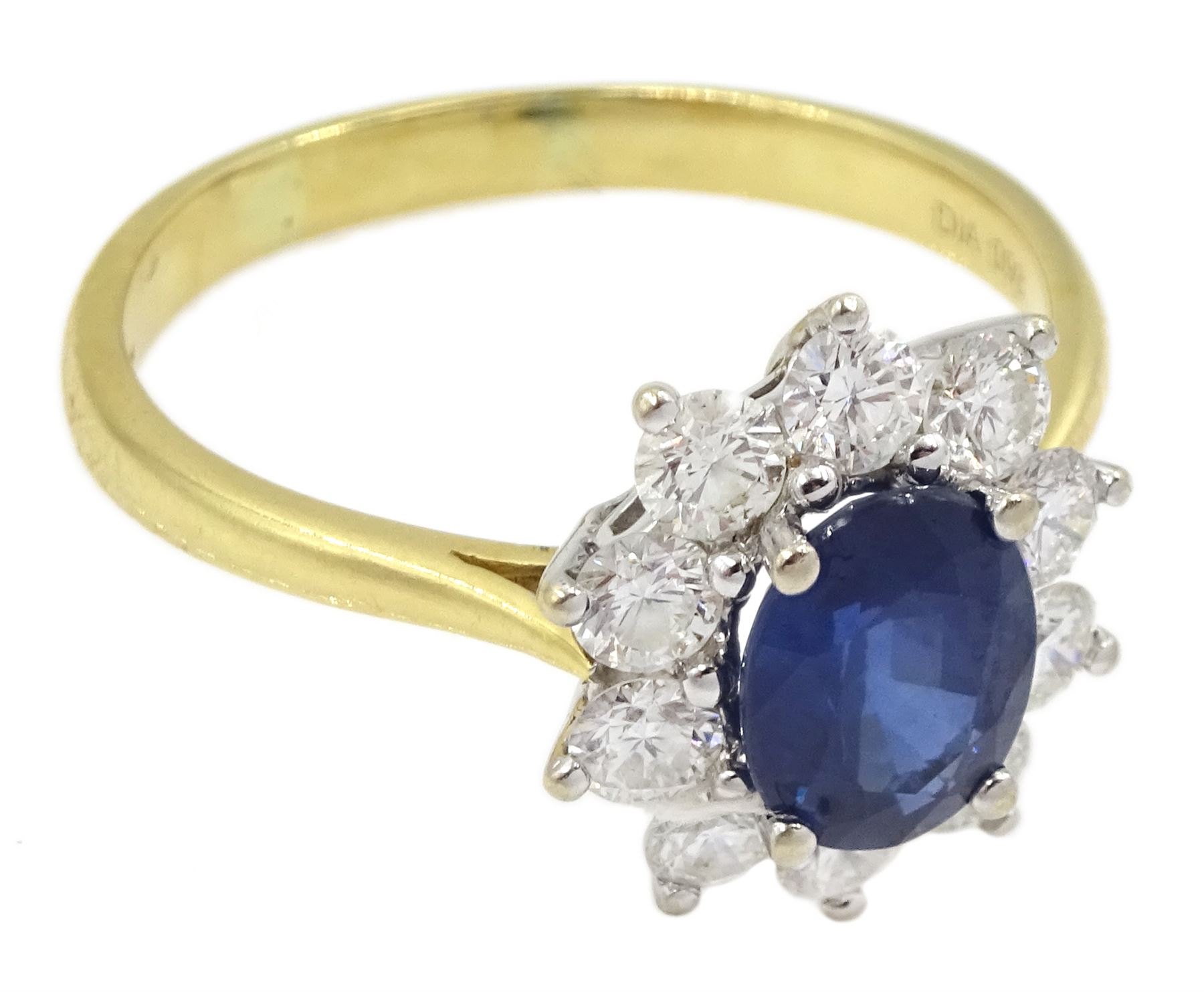 18ct gold oval sapphire and round brilliant cut diamond cluster ring, hallmarked, sapphire approx 1.40 carat, total diamond weight 0.98 carat