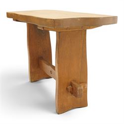 Acornman - rustic oak console table, shaped rectangular top, on shaped end supports, united by a stretcher with carved acorn signature, by the workshop of Alan Grainger, Brandsby