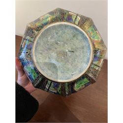 Early 20th century Wedgwood Fairland lustre bowl, circa 1920, of octagonal form, designed by Daisy Makeig-Jones, the exterior decorated in the Castle on the Road pattern, the interior decorated in the Fairy in a Cage pattern, pattern no Z5125, with printed marks beneath, H11cm D22.5cm
