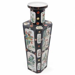 Chinese square section vase with canted corners decorated with panels of figures and landscapes on a black ground circa 1900 H51cm