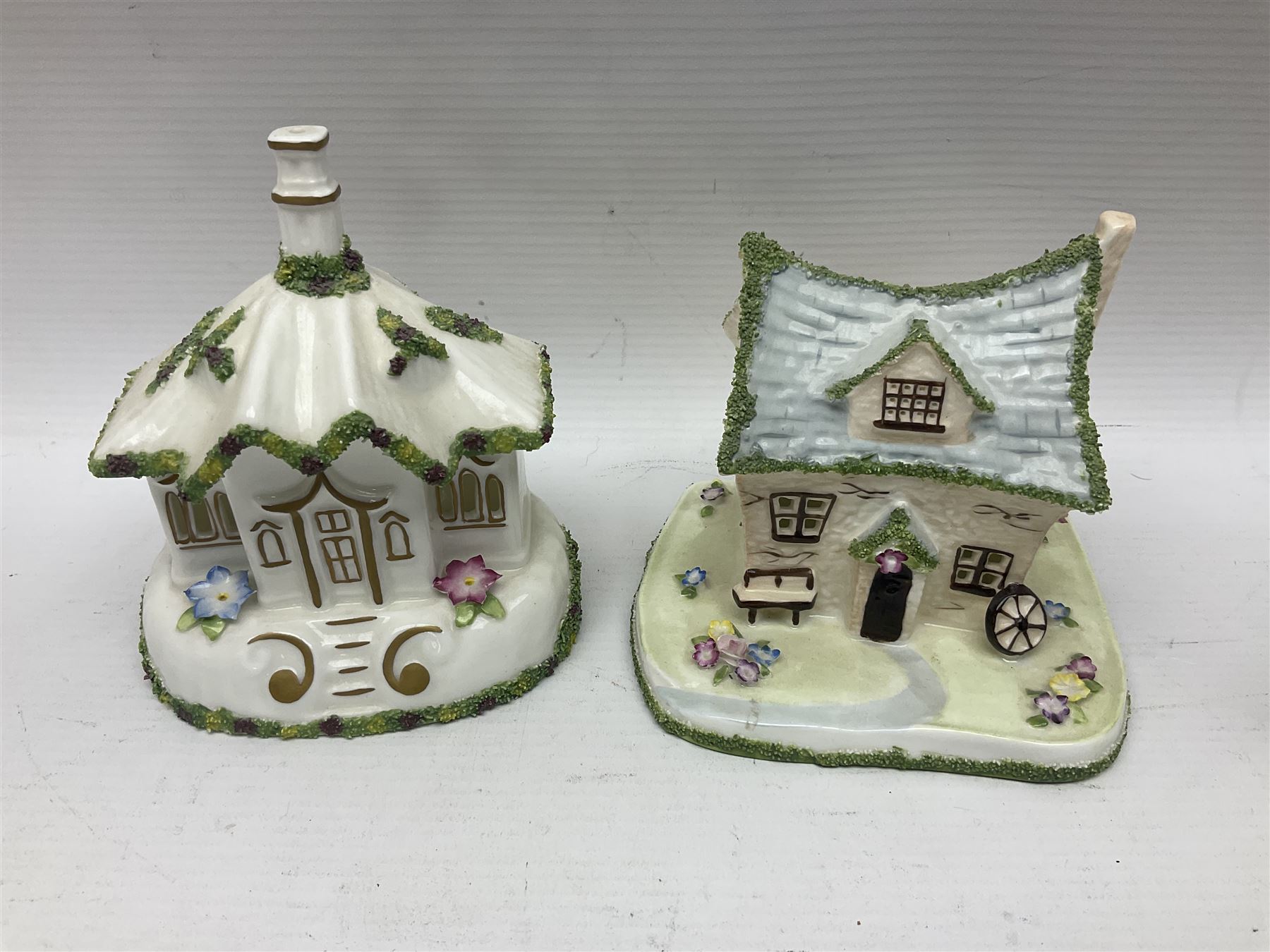 Eleven Coalport cottages, including Park Folly, The Alms House, Watermill and The Summer House, each with printed marks beneath