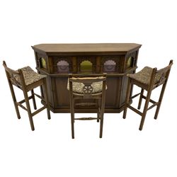 Old Charm - canted oak drinks bar, arched apertures set with mottled and bullseye colour glass panes, and three stools