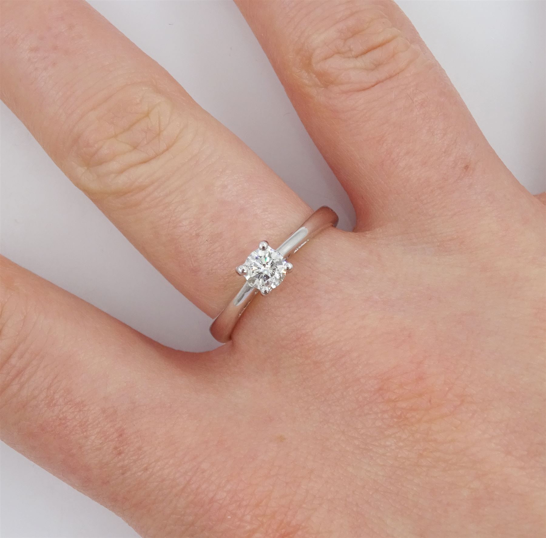 18ct white gold diamond ring, single stone round brilliant cut diamond of approx 0.30 carat, in a four claw setting, hallmarked