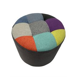 Circular revolving pouffe footstool, upholstered in grey with multi-colour patch seat