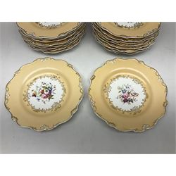 Victorian part dessert service, including eighteen plates, four small serving dishes, shallow dish, etc hand painted with floral sprigs within a cream border with floral panels, and heightened in gilt (26cm)