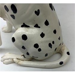 A Beswick fireside dalmation, No 2271, H35cm (a/f), a Kingston Pottery Alsatian, a Beswick Poodle, Hutschenreuther H Achtziger Poodle, and two further Poodle figurines. 