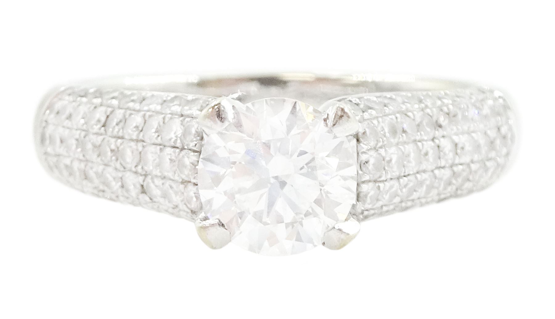 18ct white gold diamond ring, set with a single round brilliant cut diamond of approx 1.10 carat, five row pave set diamond shoulders and gallery, stamped 750, total diamond weight approx 1.50 carat