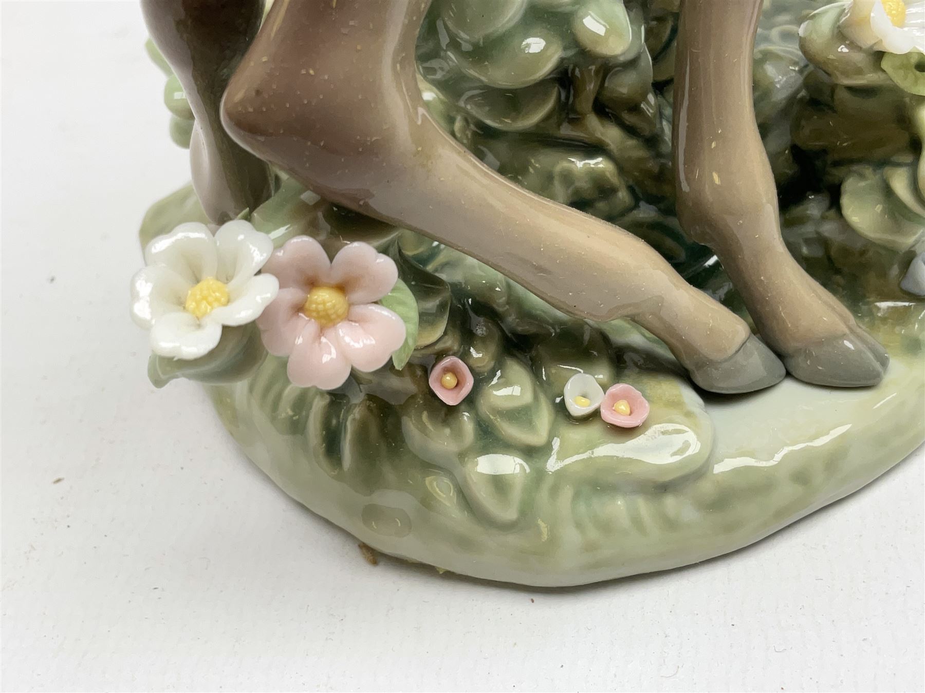 Two Lladro deer figures, comprising A Fawn and Friend no 5674 and Hi There no 5672, both with original boxes, largest example H14.5cm