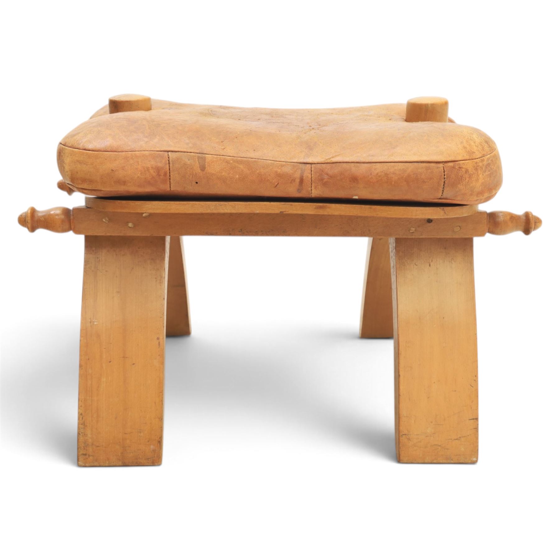 20th century Camel stool, tan leather seat with tooled design, raised on a light wood carved frame with camel design