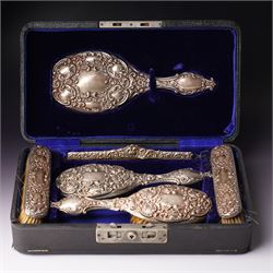 Victorian silver backed six piece dressing table set  with embossed decoration and engrave...