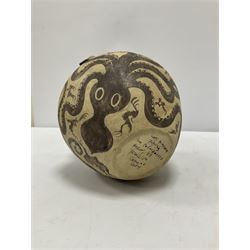 Reproduction Ancient Greek vessel in the style of Crete Minoan period, decorated with marine style ocotopi, with three handles and spout, signed beneath, H20cm