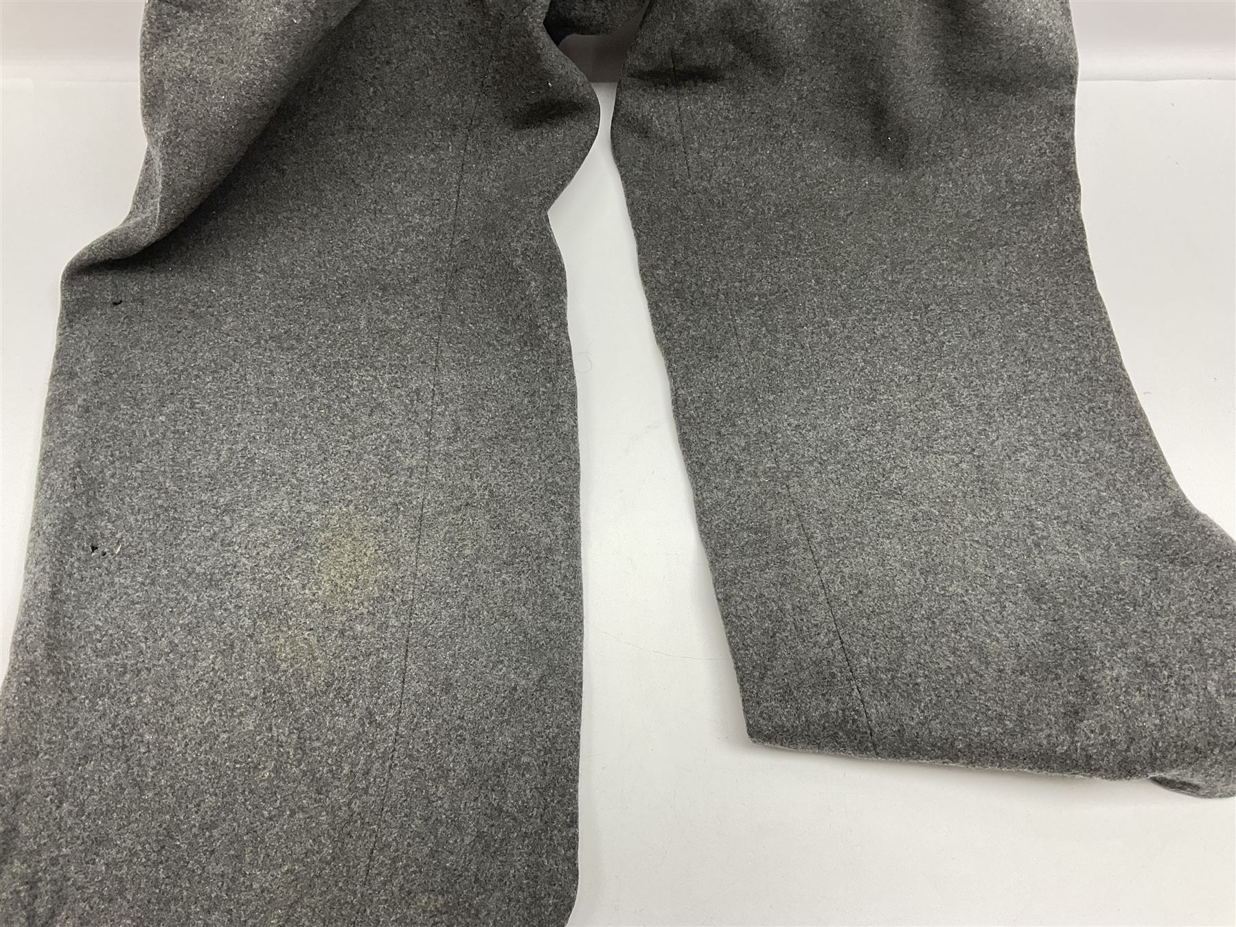 Pair of WW2 German Other Ranks trousers c1940-42, stamped C.& A. Brenninkmeyer Workstatten; WW2 German Army webbing belt with steel 'Gott Mit Uns' buckle; and WW2 German leather belt with 'Stahlhelm' (Steel Helmet League) members buckle (3)