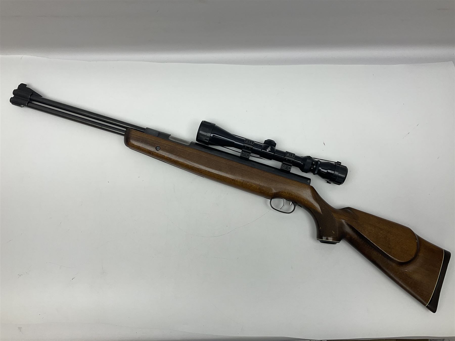 Weihrauch model HW 77 K  .22 air rifle with under lever action, beech stock with chequered pistol grip and Tasco WA39x40-1 scope, serial no.1283661 L102cm overall NB: AGE RESTRICTIONS APPLY TO THE PURCHASE OF THIS LOT