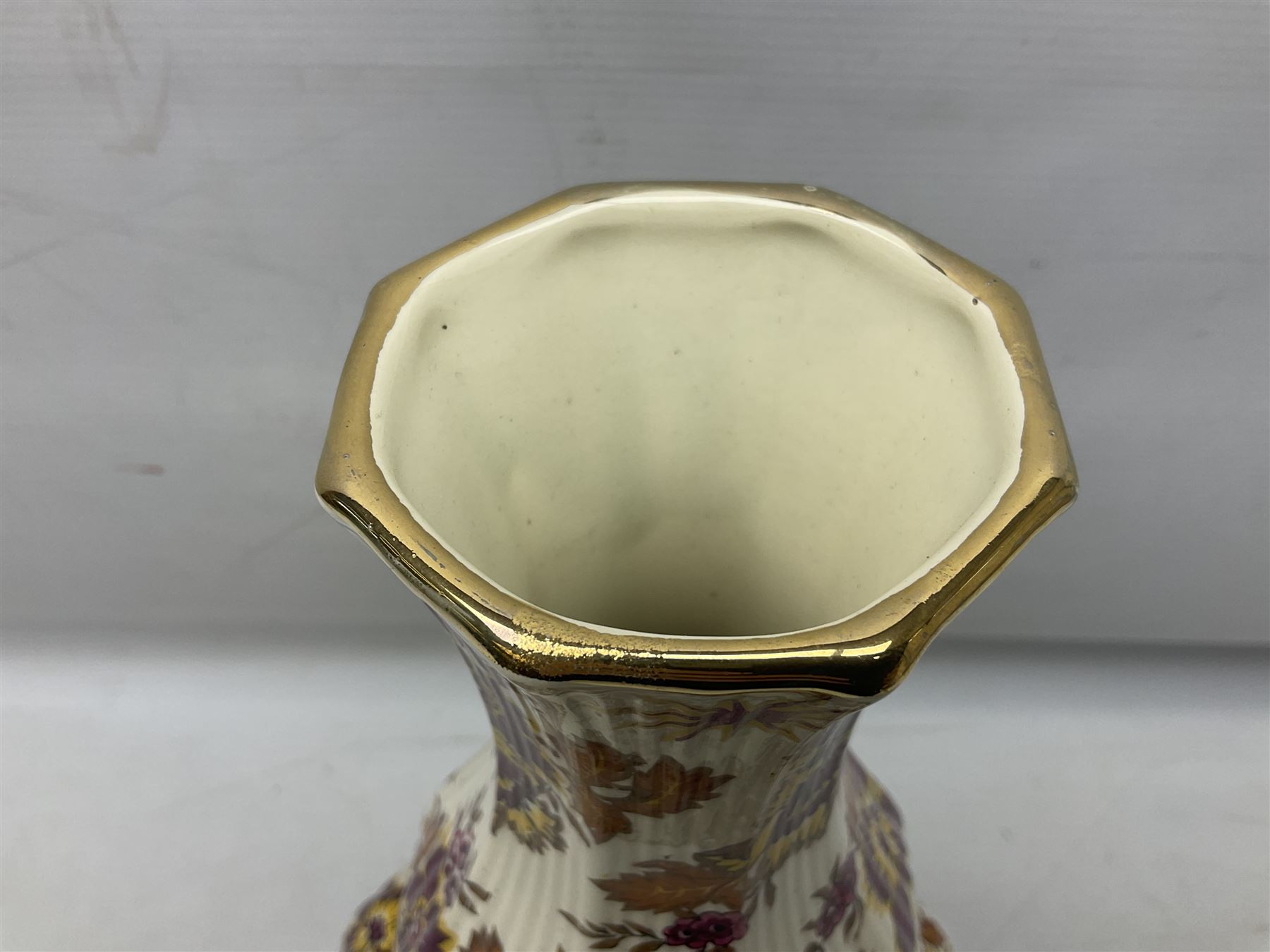 Mid 20th century Boch Freres of Belgium Keralux Fleur De Saxe vase, of double gourd form with pink and yellow flowers amongst orange foliage and gilt decoration, H44cm