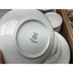 Large quantity of Porcelana Real Brasil White Blossom pattern tea and dinner wares, to include dinner plates, tea cups and saucers, salt and pepper pots, tureens, pie dishes coffee pots, place mats, spoons and glasses, etc, in five boxes 