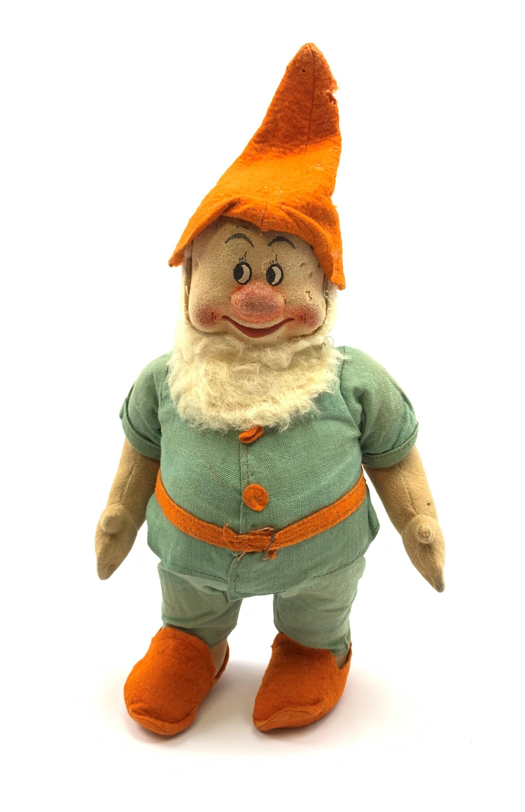 Chad Valley pressed felt figure of the Disney Snow White dwarf 'Doc' with painted facial features, standing wearing a green linen suit with orange hat, belt, buttons and shoes H13