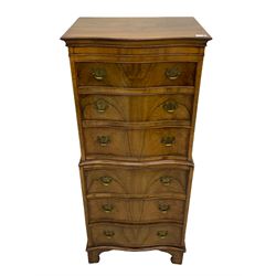 Burton Reproductions walnut chest on chest, fitted with six serpentine drawers