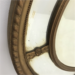 Early 20th century oval gilt framed mirror, 112cm x 83cm