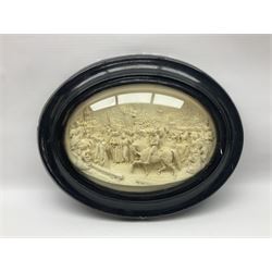 Justin Mathieu; oval high relief plaque depicting a battle scene, within frame H36cm
