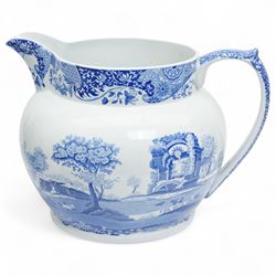 Large Spode Italian blue and white jug H23cm, 20th century Delft vase and cover decorated with landscape and floral design H38cm, Ringtons Tea Merchants blue and white tea caddy H20cm and a Ringtons jug (4)