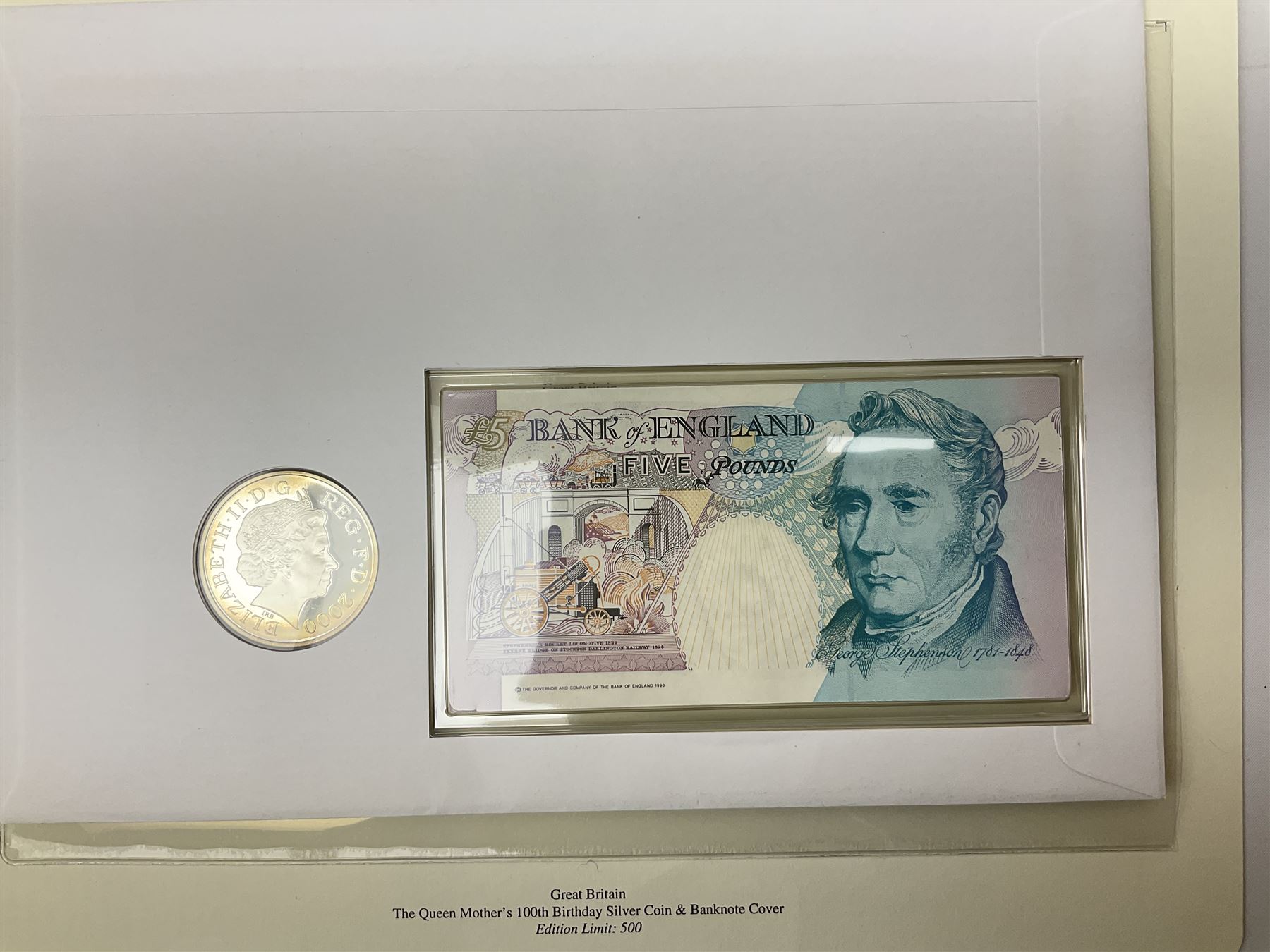 Four coin covers, comprising 2000 'The Queen Mother's 100th Birthday Silver Coin & Banknote Cover' limited edition 56/500, 2000 'Charles Darwin Commemorative Coin & Banknote Cover' limited edition 68/500, 2001 'Celebrating the 100th Birthday of Her Majesty The Queen Mother' containing  a 1999 silver one pound coin and 2001 'Royal Navy Submarines 100th Anniversary Cover' containing 2001 Turks & Caicos Islands 20 crowns silver coin