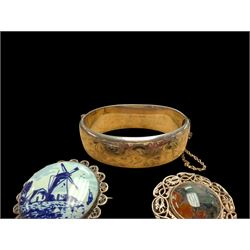 Silver bangle with four silver brooches