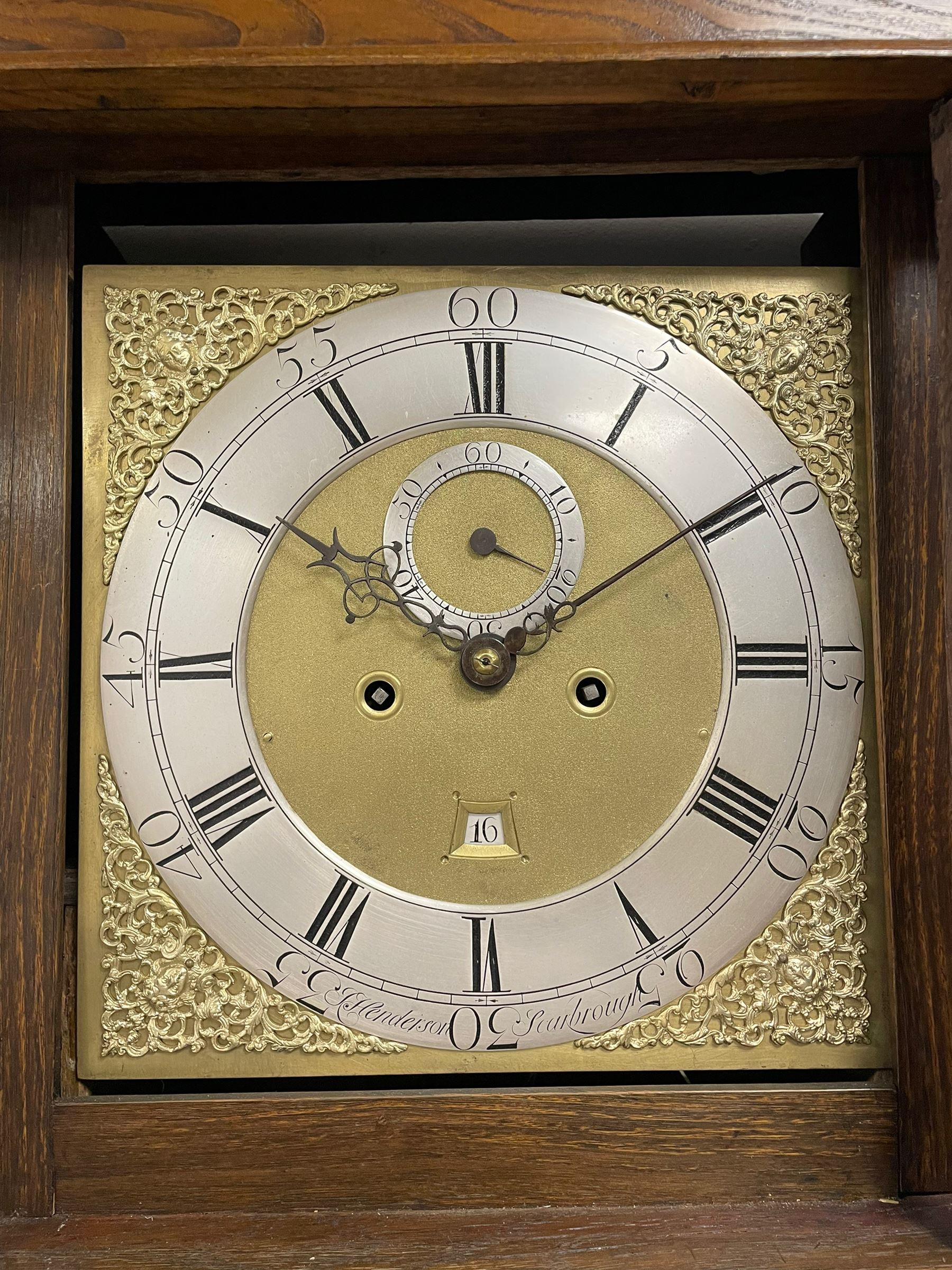Jeremiah Henderson of Scarborough - 8-day longcase clock in an Elm case c1765,  with a flat top and broad cornice, square hood door flanked by two plain turned pilasters with gesso capitals, long trunk with a conforming door and break arch top, square brass dial with a matted centre, cast spandrels and ringed winding holes, silvered chapter ring with Roman numerals, five minute Arabic's, minute track and finely pierced matching steel hands, dial pinned to a rack striking movement with an anchor escapement. With weights and pendulum. Jeremiah Henderson was the son of Robert Henderson, the first recorded clockmaker in Scarborough. 